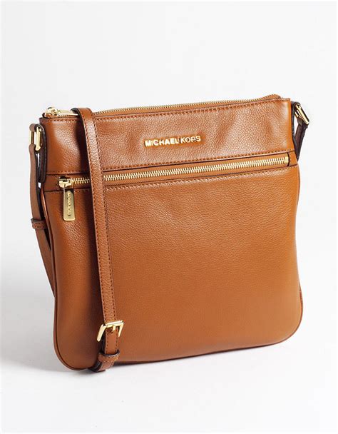 michael kors cross body bag brown|Michael Kors brown leather handbag.